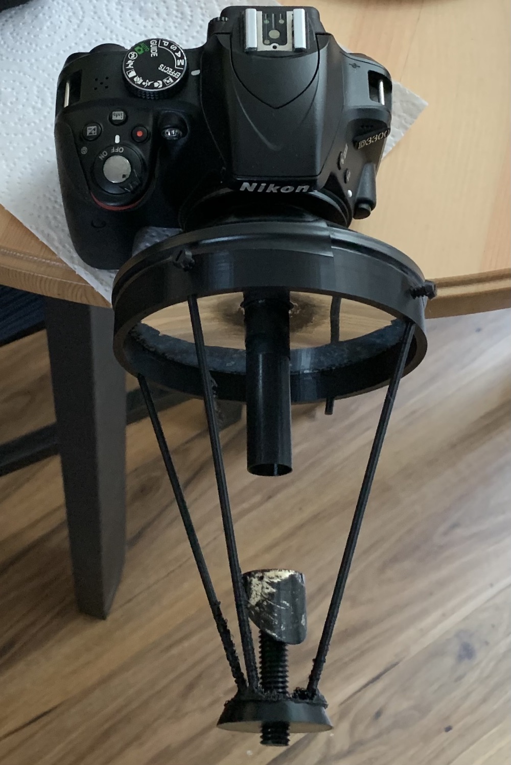 A photo of the telescope mounted on a camera.