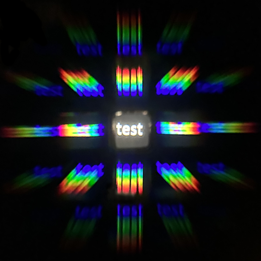 A photograph showing the nine images formed of the word 'test'.