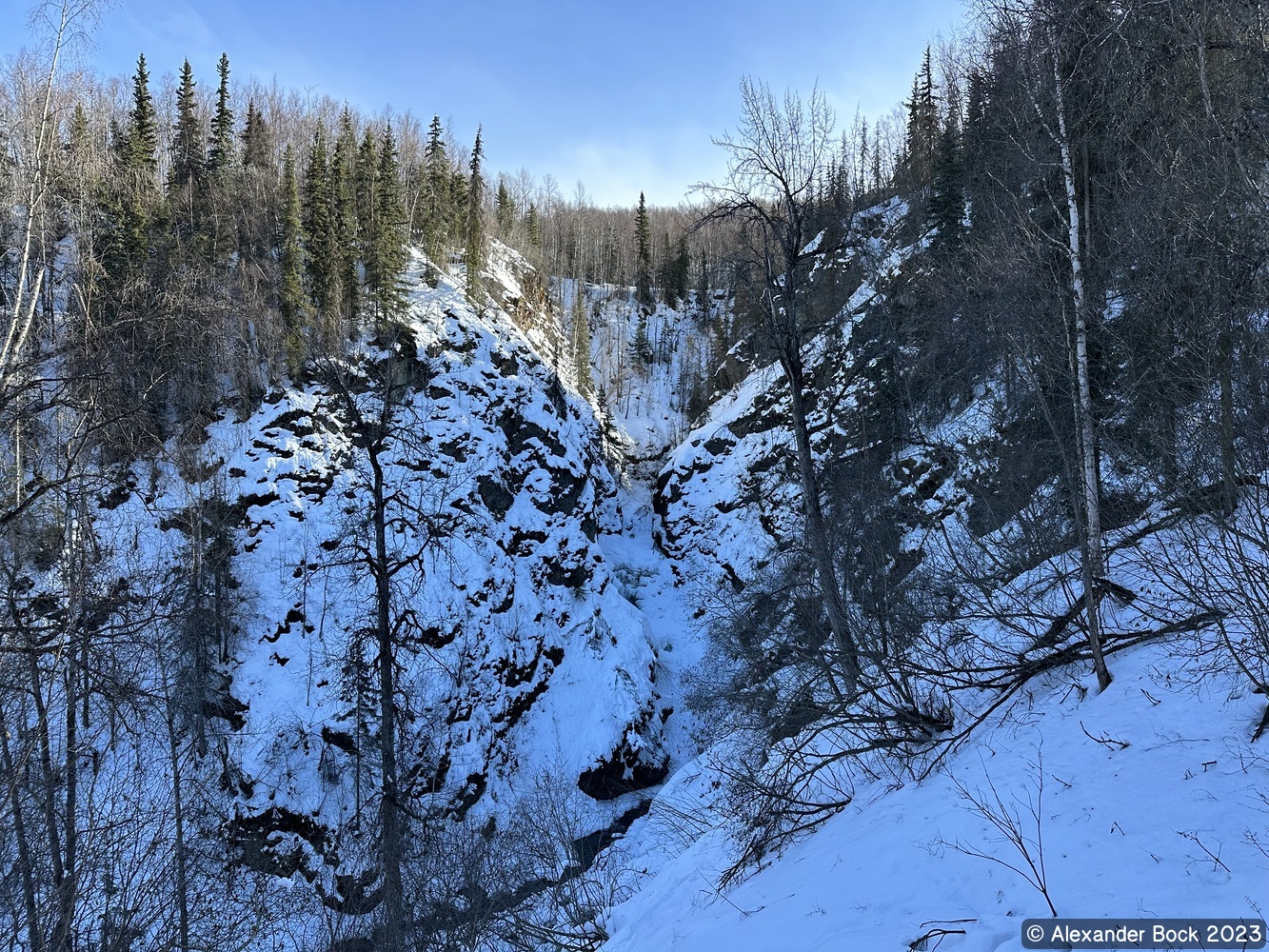 Thunderbird falls obscured by snow and ice