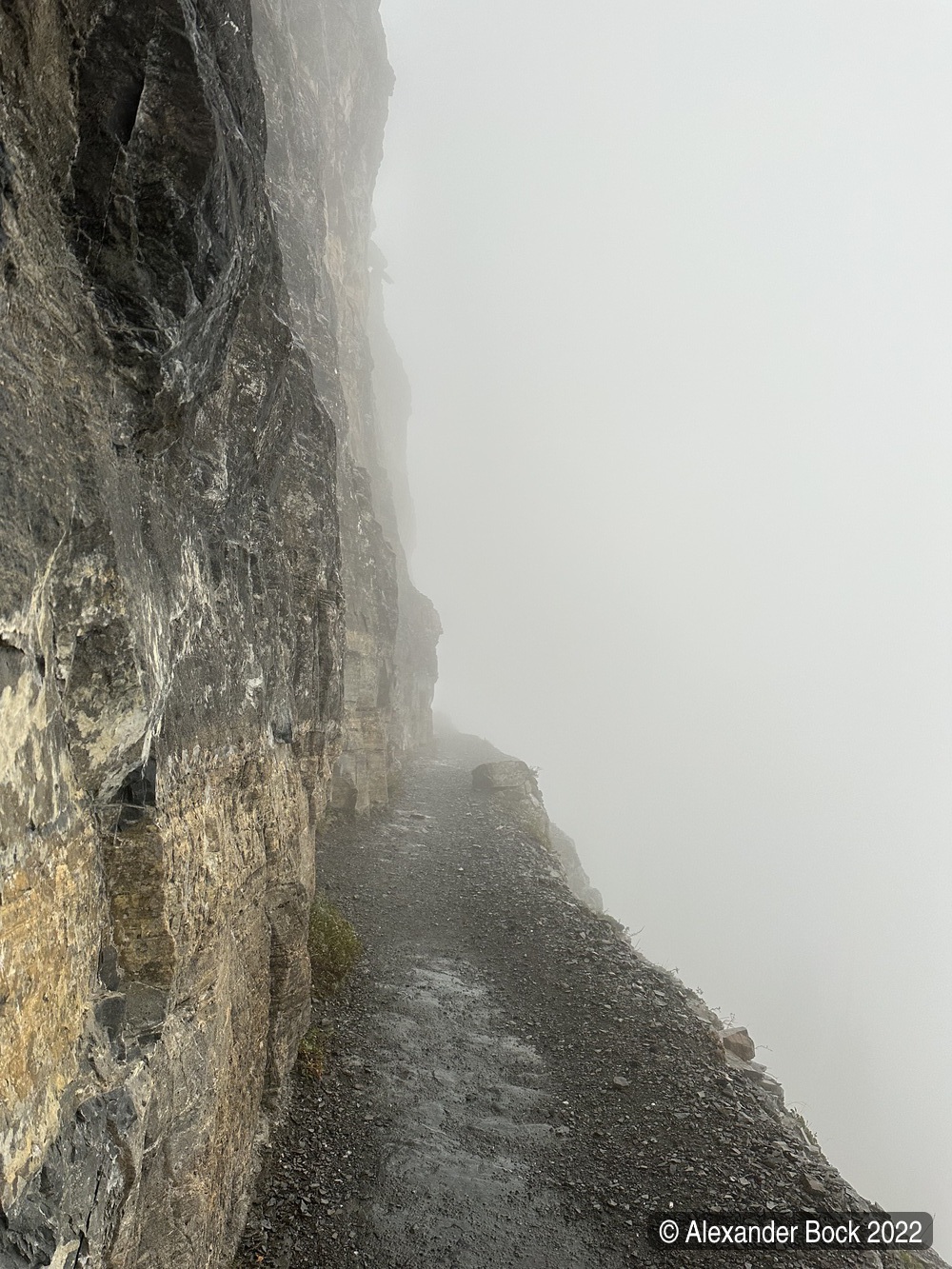 Glacier National Park rock ledge with fog